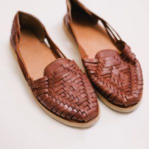 Brown leather flats